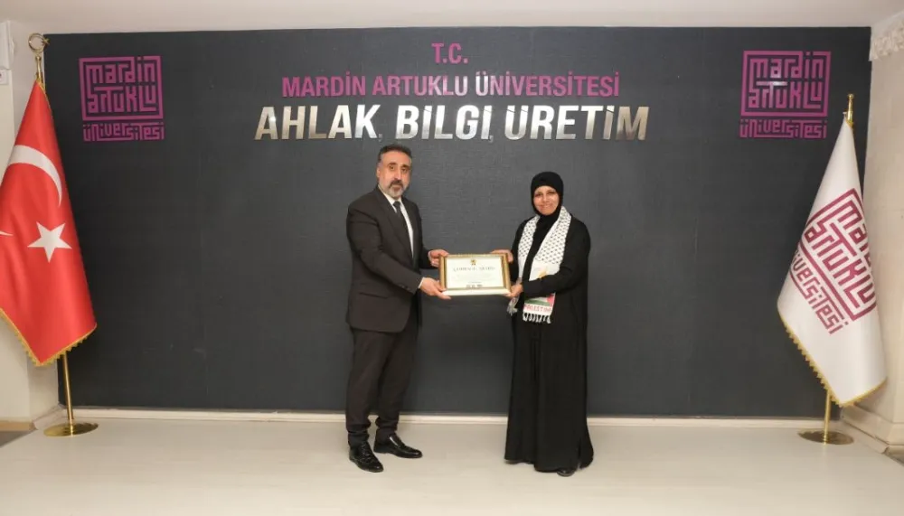 MARDİN ARTUKLU  ÜNİVERSİTESİ CESARET ÖDÜLÜ VERDİĞİ GAZZELİ AKADEMİSYENİ GÖREVE BAŞLATTI